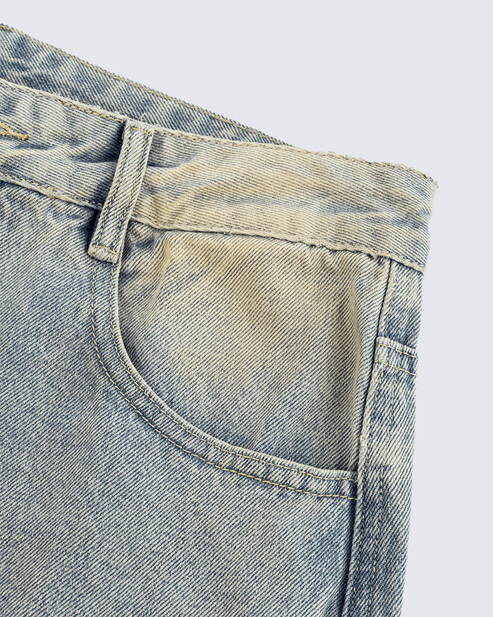 Wide-Leg Denim Jeans with Buttoned Hem