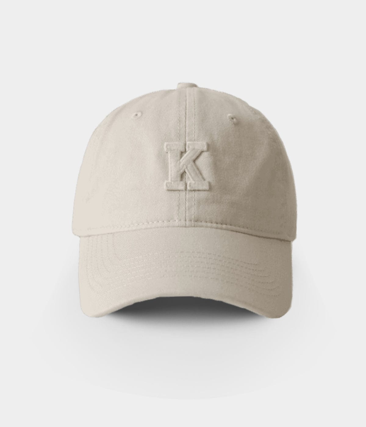 K.
